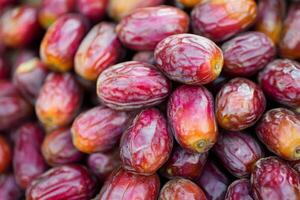 A close up of a bunch of dates photo