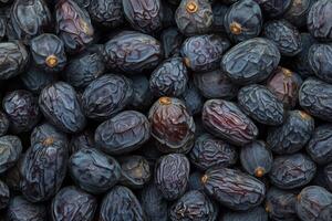 A close up of a bunch of dates photo