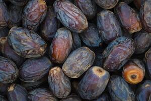 A close up of a bunch of dates photo