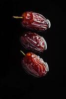 Three dates on a black background photo