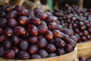 A basket full of dates sitting on a table photo