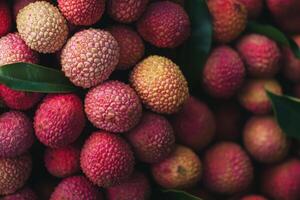 A close up of a bunch of lychees photo