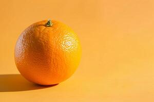 Orange on a yellow background photo