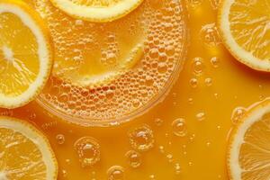 Orange juice with bubbles and slices of orange photo