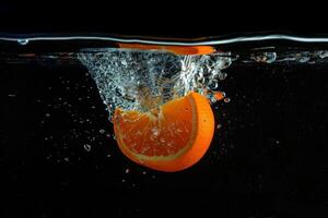 An orange slice in the water photo