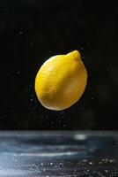 A lemon is being thrown into the air photo