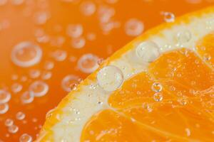 A close up of an orange with bubbles on it photo