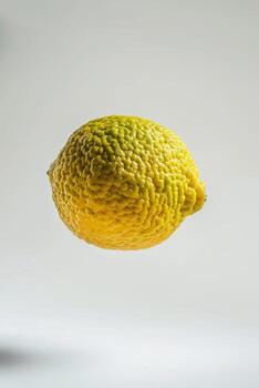 A lemon is floating in the air photo