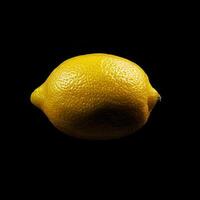 A lemon is shown against a black background photo