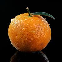 An orange with water drops on it photo