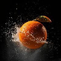 An orange being splashed with water photo
