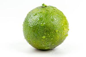 A lime with water droplets on it photo