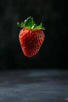 A strawberry is flying in the air photo