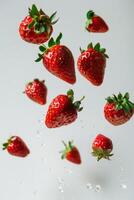 Strawberries falling from the air photo