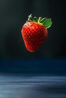 A strawberry is flying in the air photo