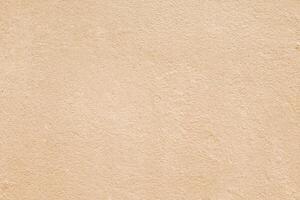 Texture of rough beige plaster. Architectural abstract background. photo