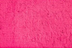Abstract pink background. Pink color of rough surface. photo