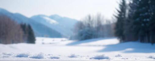 A snowy landscape with trees in the background photo