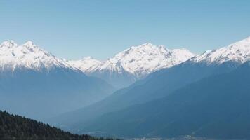 The mountains are covered in snow photo
