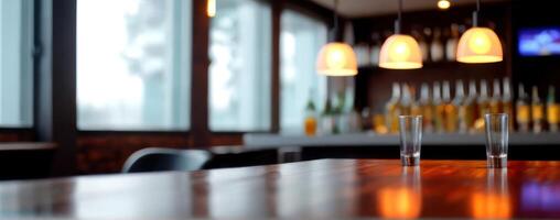 A wooden table with glasses on it photo