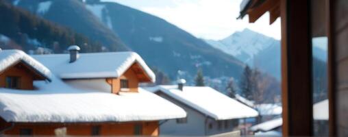 A view of snow covered houses in the mountains photo