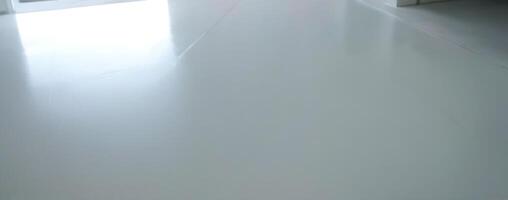 An image of a white floor in an empty room photo