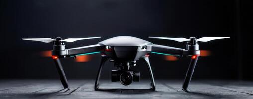 A black and white dji phantom quadcopter with two propellers photo