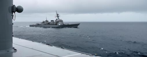 A navy ship in the ocean photo