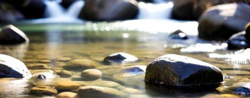 Rocks and water in a stream photo