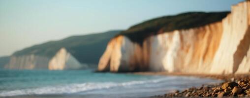 A beach with cliffs in the background photo
