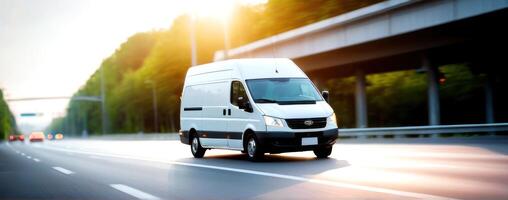A white van is driving down the road photo