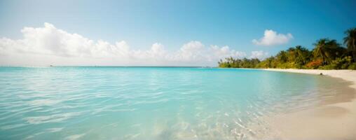 A beach with clear water and white sand photo