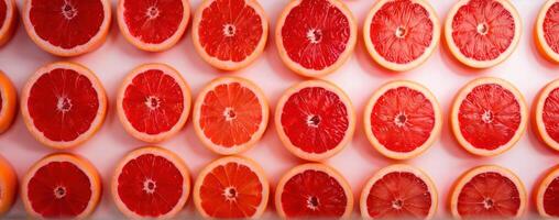 Sliced grapefruits on a white background photo