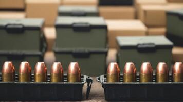 A group of bullets sitting on top of boxes photo