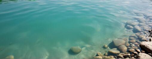 A close up of water with rocks in it photo