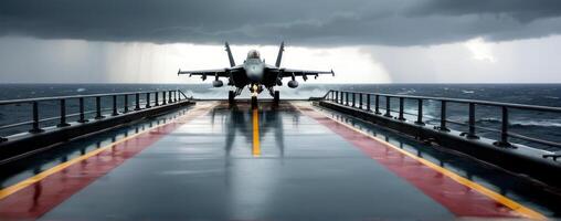 A fighter jet is landing on the deck of an aircraft carrier photo