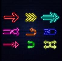 A set of neon arrows and pointers of different colors on the background of the wall. vector