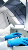 A medical research laboratory with a diverse team of biochemical scientists working with computers and modern medical technologies. Development of high-tech equipment for medicines video