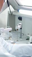 A medical research laboratory with a diverse team of biochemical scientists working with computers and modern medical technologies. Development of high-tech equipment for medicines video