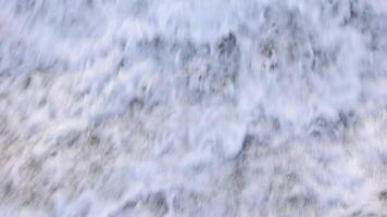 Close-up of the waterfall. Rapid flow of water as a background or texture. video
