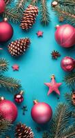 Colorful Christmas decorations arranged on a turquoise background with holiday-themed elements photo
