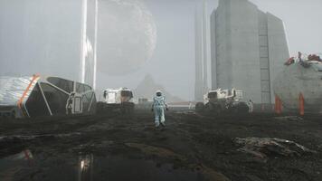 An astronaut Walks on the Surface of a Planet with a view of Space Colonization video