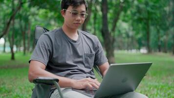 Serious and committed programmers are looking for inspiration in their decision-making. feeling lost thinking Stressed out from work Sitting in the park. Working online. Worried. Working in the park. video