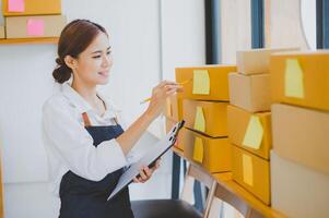 Small business owners online are checking their orders. where customers place orders and check the orders that the customers have ordered of online retailers - online shopping photo