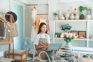 Small business owners inspecting merchandise And talk to customers to buy products and take orders that customers order from online retailers - online shopping. photo