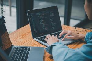 Female programmer working on coding, software development and web design.Concept technology development. photo