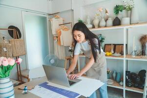 Small business owners inspecting merchandise And talk to customers to buy products and take orders that customers order from online retailers - online shopping. photo