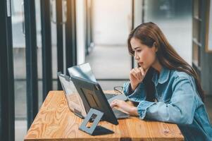 Female programmers are thinking and planning to work on programming, software coding and web design.Concept technology development. photo