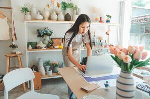 Small business owners inspecting merchandise And talk to customers to buy products and take orders that customers order from online retailers - online shopping. photo