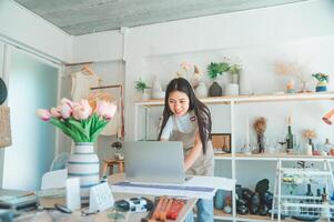 Small business owners inspecting merchandise And talk to customers to buy products and take orders that customers order from online retailers - online shopping. photo
